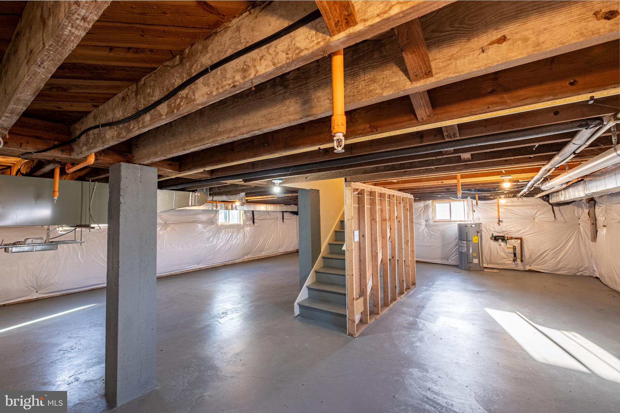 7391 Benedict Avenue Benedict, MD 20612 - Photo 35 of 38 a view of empty room with wooden floor