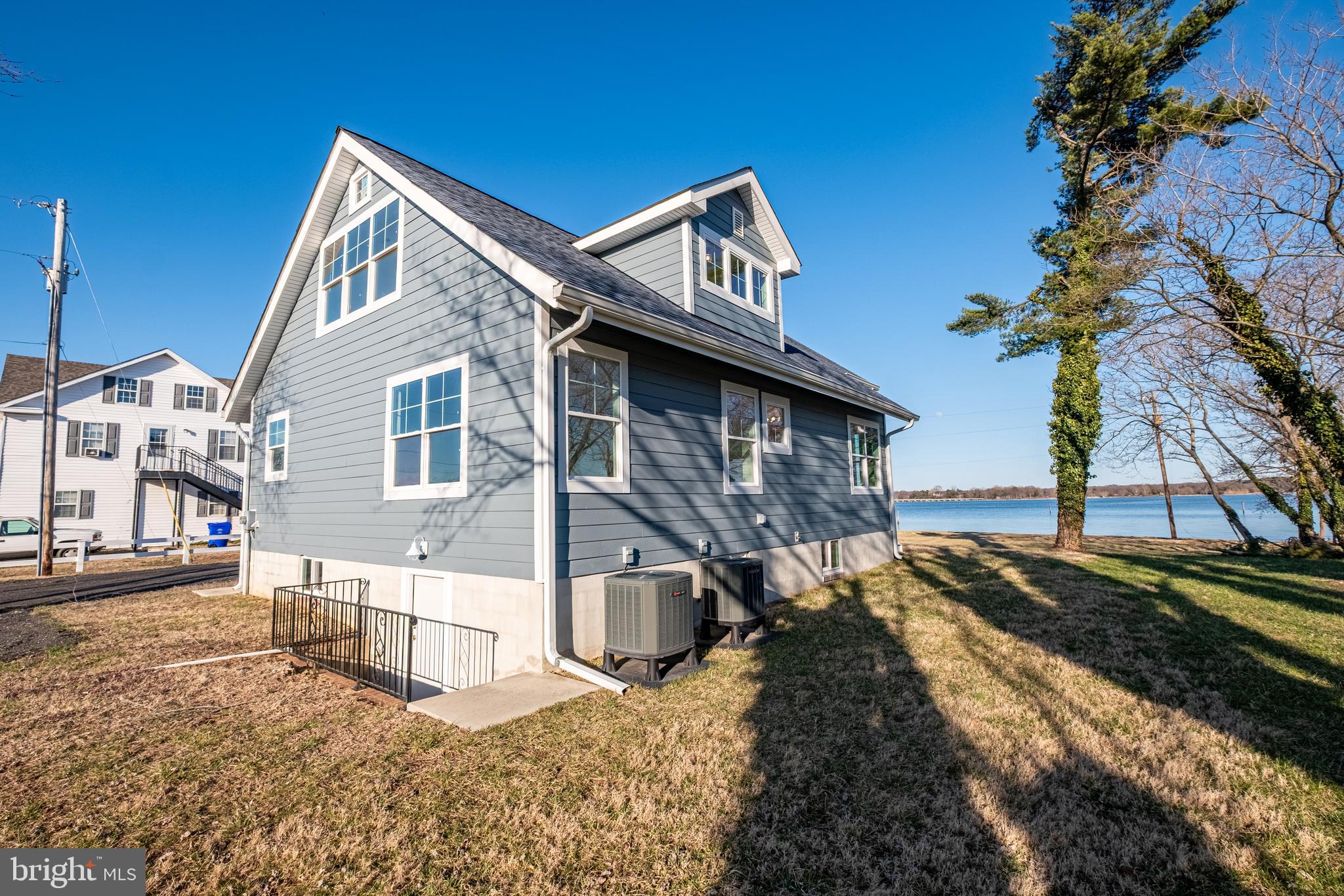 7391 Benedict Avenue Benedict, MD 20612 - Photo 4 of 38 a view of a house with a yard