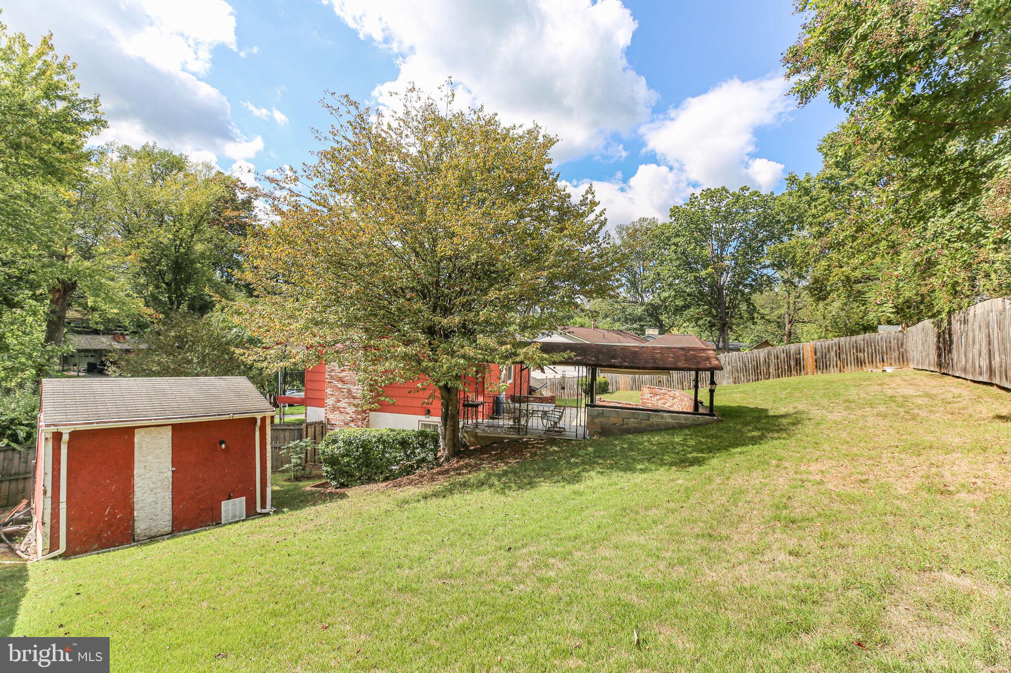 19007 Red Oak Lane Triangle, VA 22172 - Photo 31 of 34 a view of a house with a yard