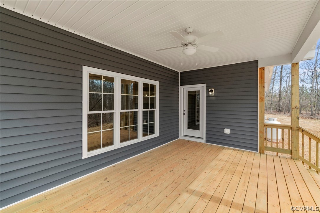 3267 Paynes Mill Road Bumpass, VA 23024 - Photo 31 of 33 a view of a balcony with a ceiling fan