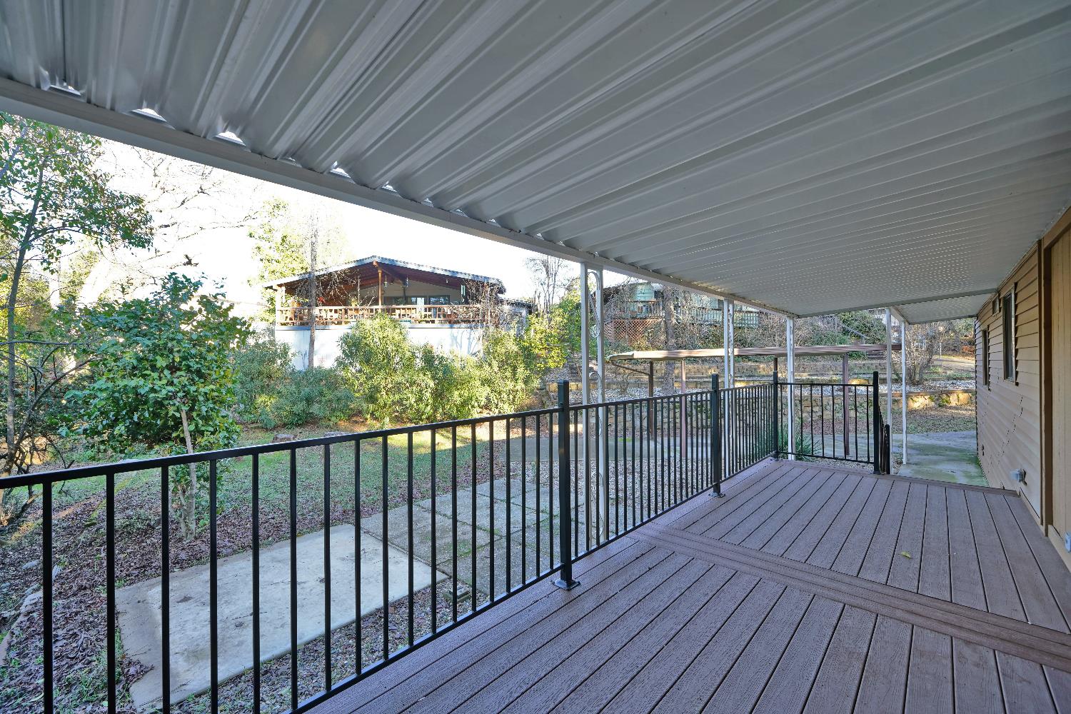 4420 Pleasant Valley Road, Unit 155 Diamond Springs, CA 95619 - Photo 5 of 42 a view of a balcony with wooden floor
