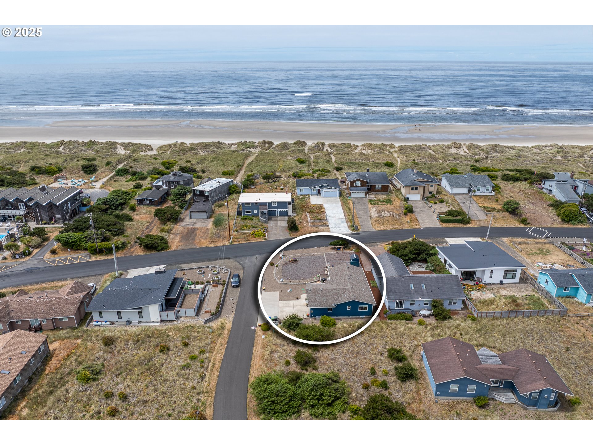 1602 Northwest Oceanic Loop Waldport, OR 97394 - Photo 32 of 47 an aerial view of a house with a ocean view