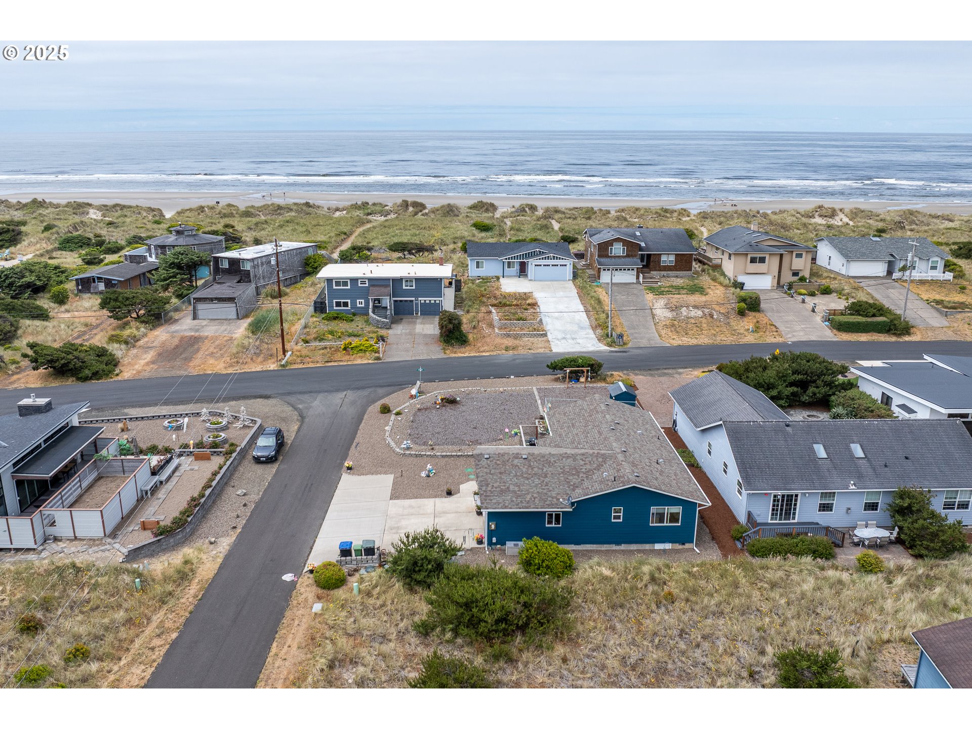 1602 Northwest Oceanic Loop Waldport, OR 97394 - Photo 37 of 47 an aerial view of residential houses with outdoor space