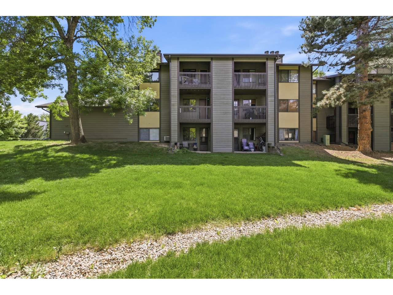 925 Columbia Road, Unit 824 Fort Collins, CO 80525 - Photo 1 of 36 a view of a house with a yard and front view of a house