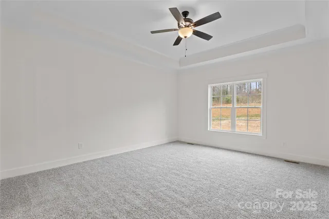 a white bath tub sitting next to a white sink