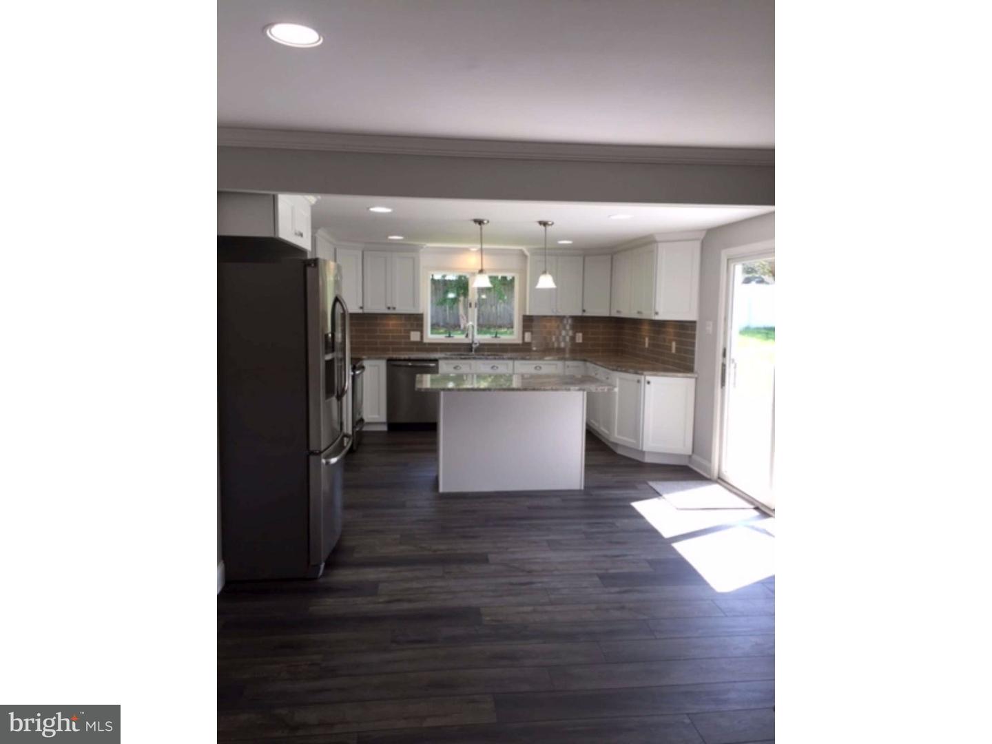 103 Greenbriar Road Delran, NJ 08075 - Photo 14 of 18 a kitchen with stainless steel appliances a refrigerator and a sink