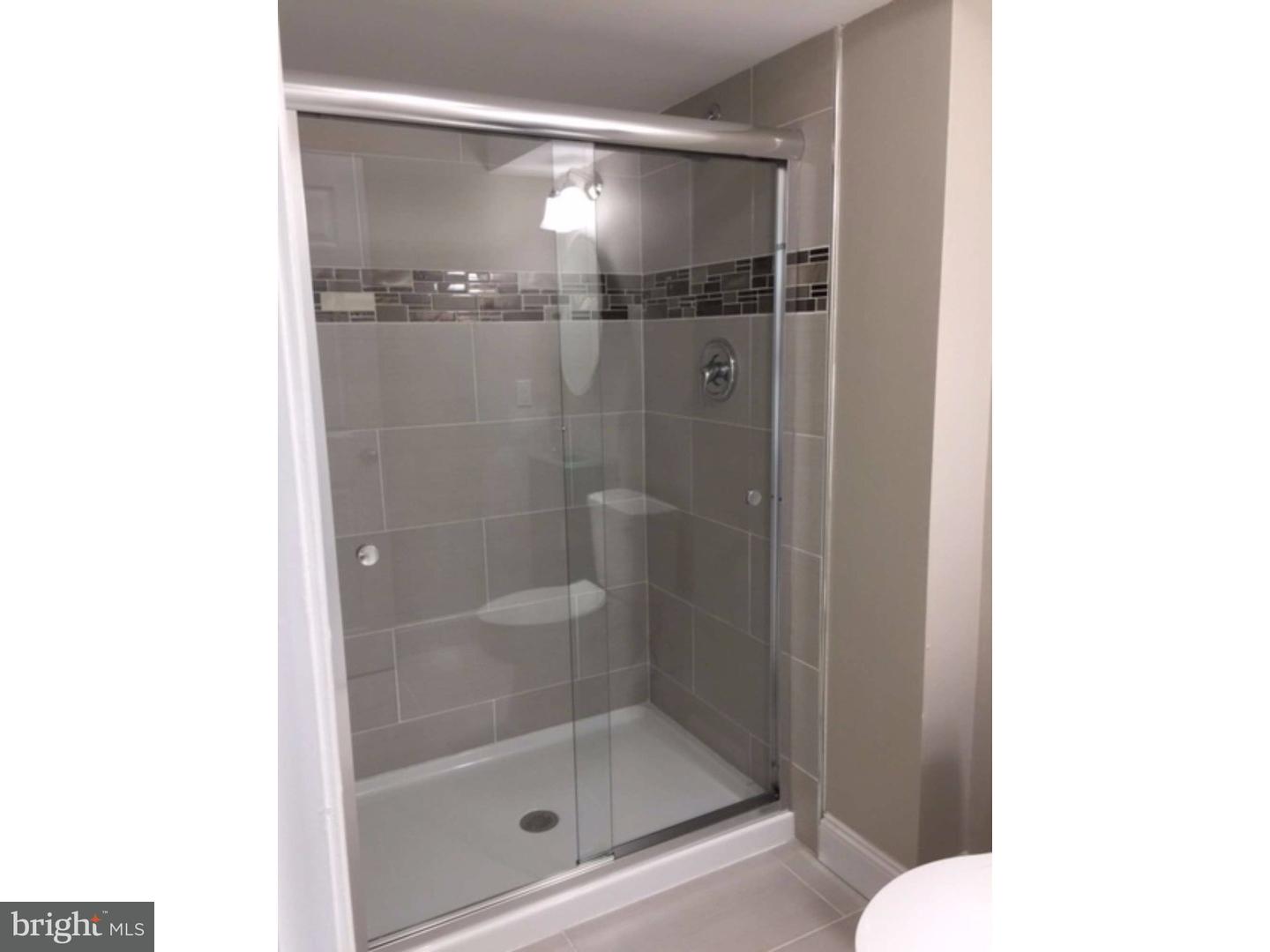 103 Greenbriar Road Delran, NJ 08075 - Photo 6 of 18 a bathroom with a shower and bathtub