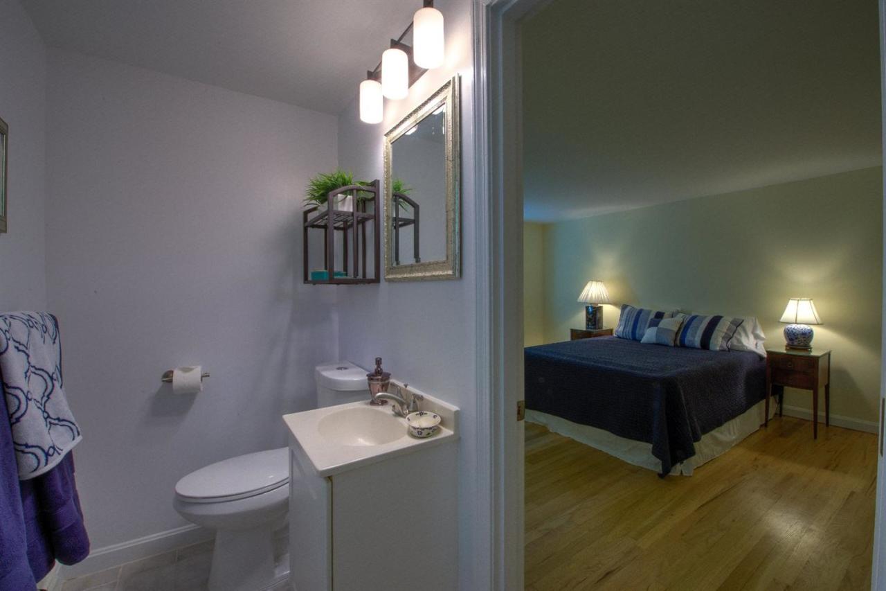90 Ralyn Road Cotuit, MA 02635 - Photo 14 of 29 a bathroom with a sink toilet and a mirror