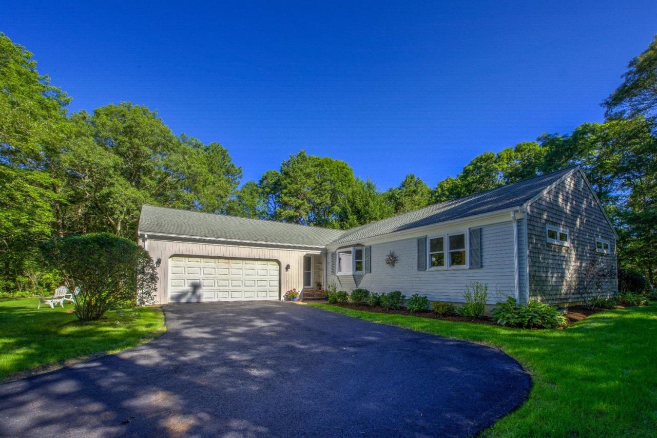 90 Ralyn Road Cotuit, MA 02635 - Photo 2 of 29 a view of a house with a yard