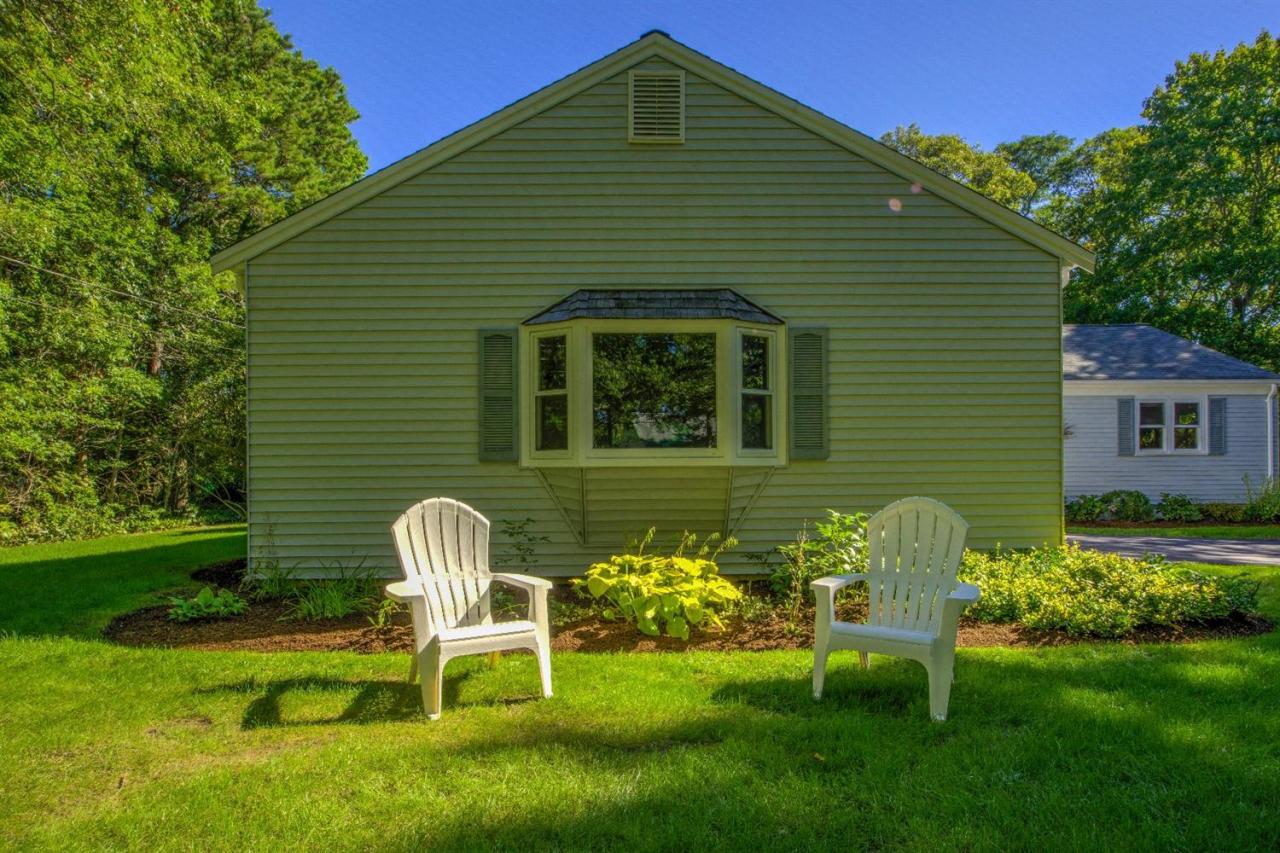 90 Ralyn Road Cotuit, MA 02635 - Photo 27 of 29 a front view of a house with garden