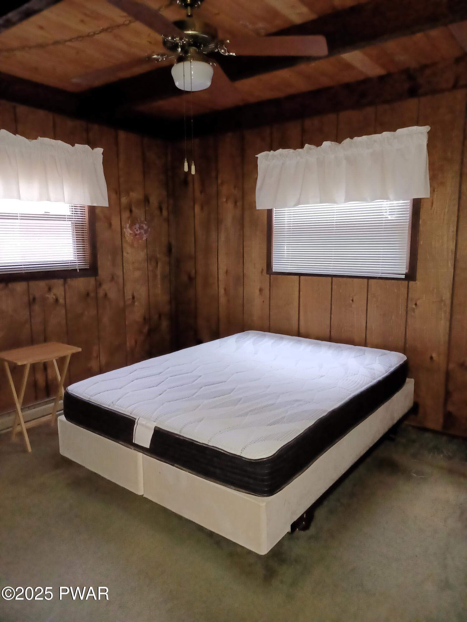 540 Northgate Road Lake Ariel, PA 18436 - Photo 10 of 40 a bed sitting in a bedroom next to a window