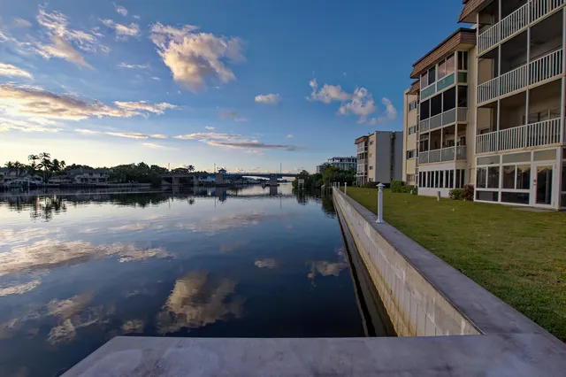 a view of a lake with a yard