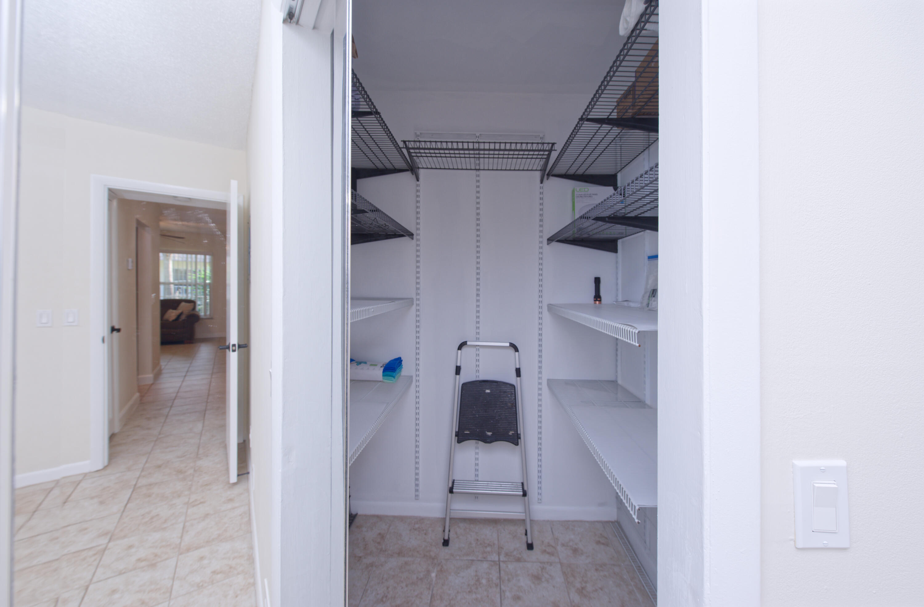 632 Snug Harbor Drive, Unit D15 Boynton Beach, FL 33435 - Photo 15 of 50 a view of walk in closet with white walls