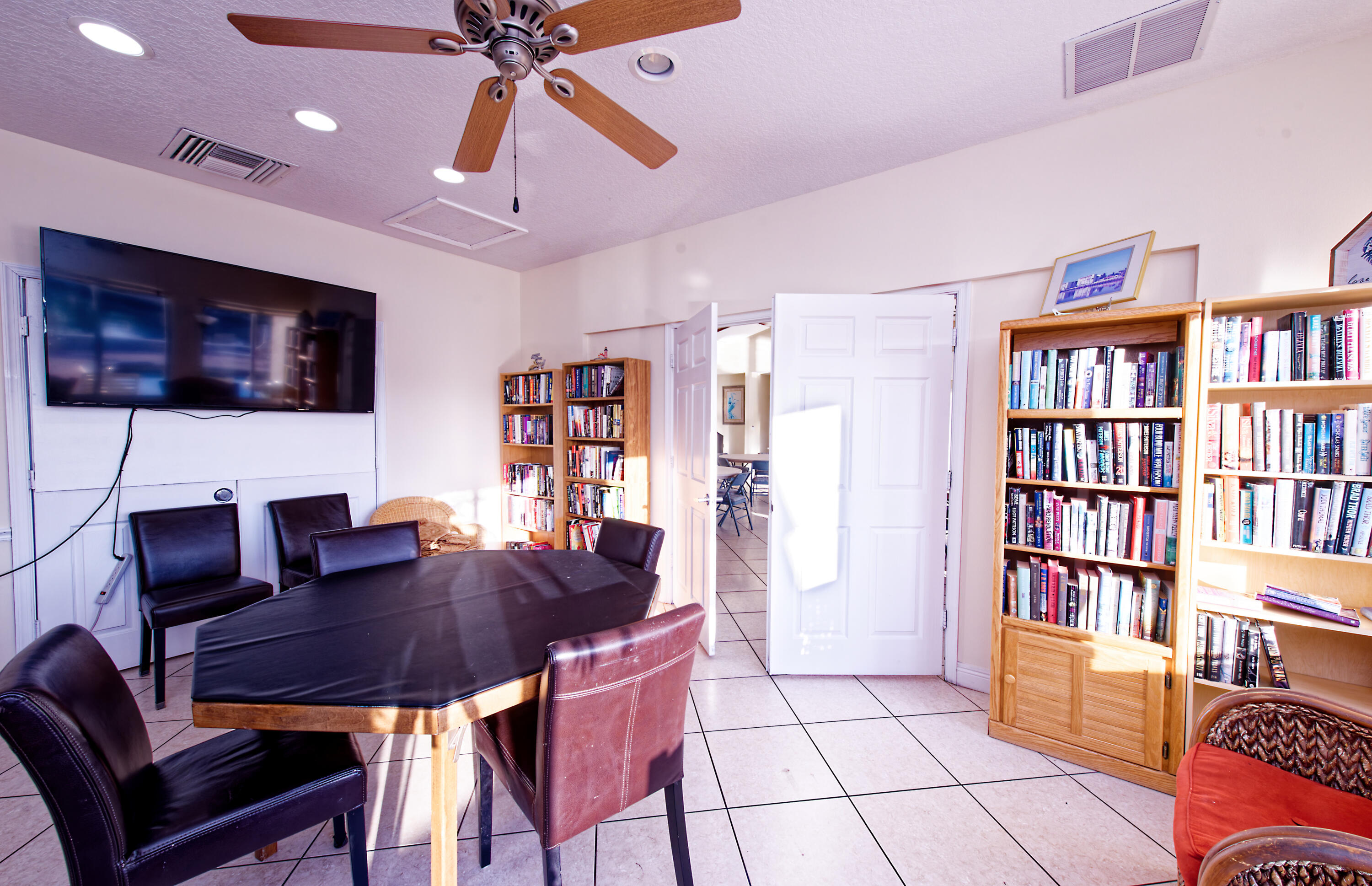 632 Snug Harbor Drive, Unit D15 Boynton Beach, FL 33435 - Photo 25 of 50 a view of a livingroom with furniture and a flat screen tv