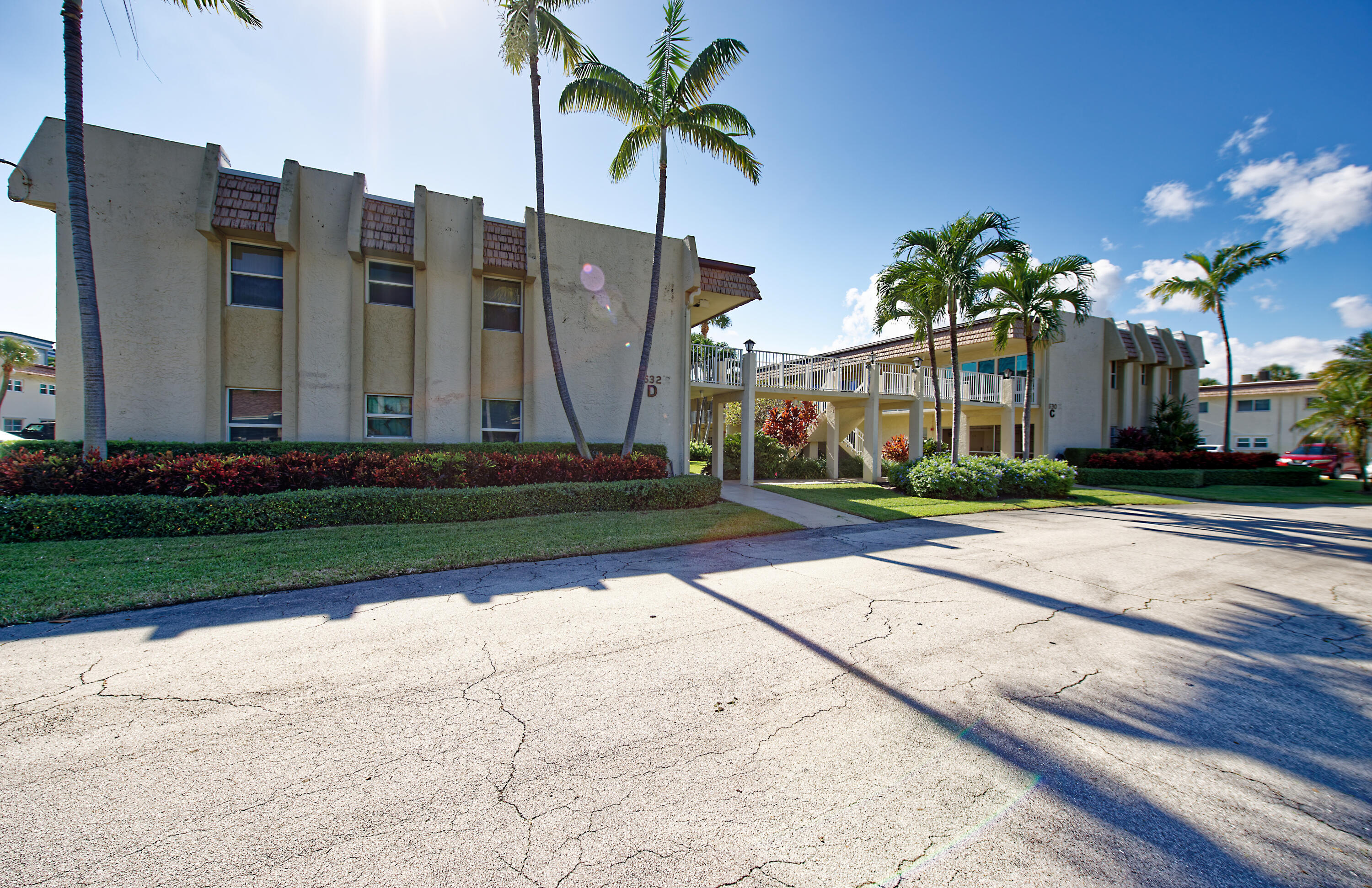 632 Snug Harbor Drive, Unit D15 Boynton Beach, FL 33435 - Photo 27 of 50 a view of a street with a building in the background