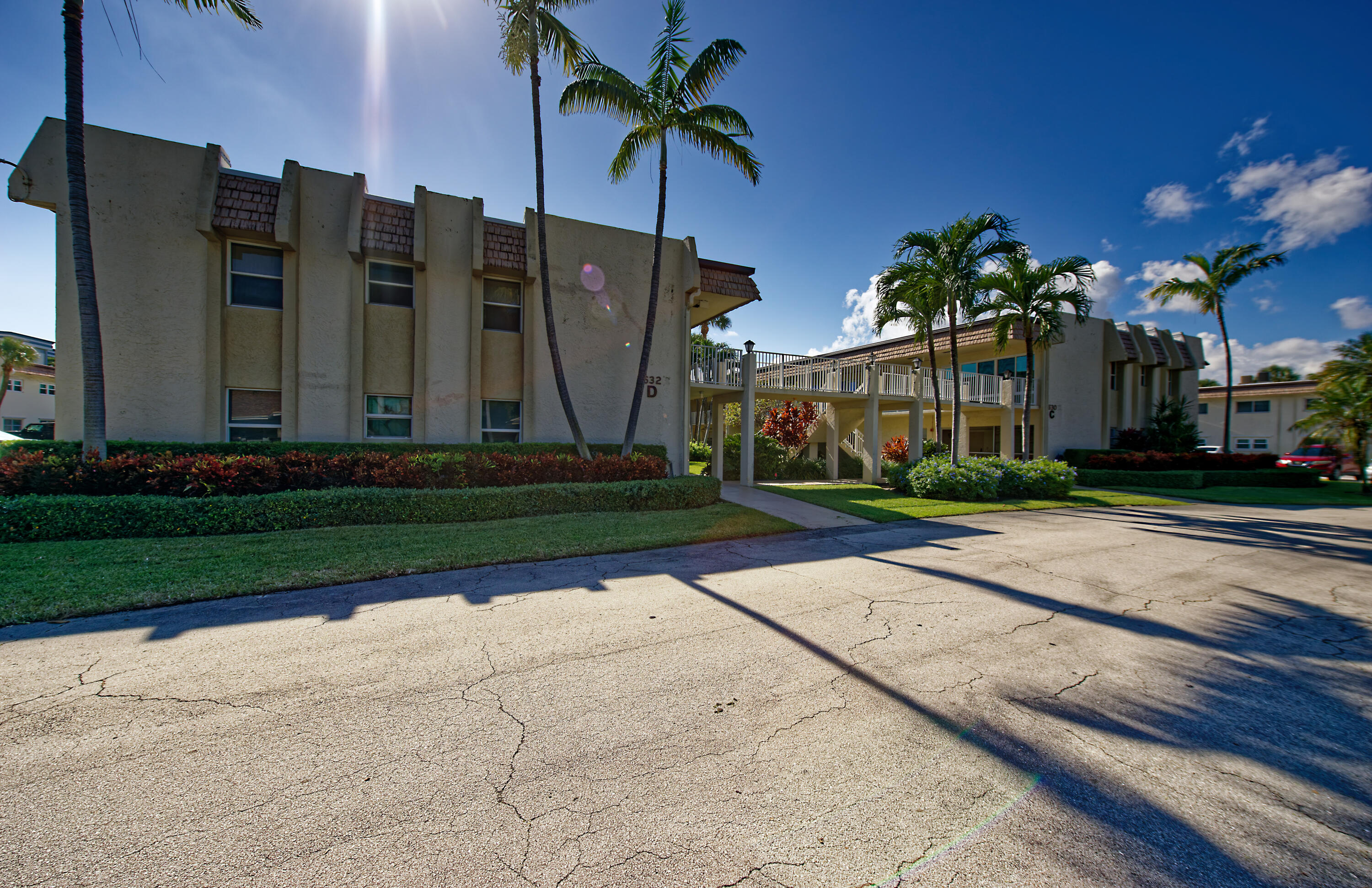 632 Snug Harbor Drive, Unit D15 Boynton Beach, FL 33435 - Photo 28 of 50 a view of a street with a building