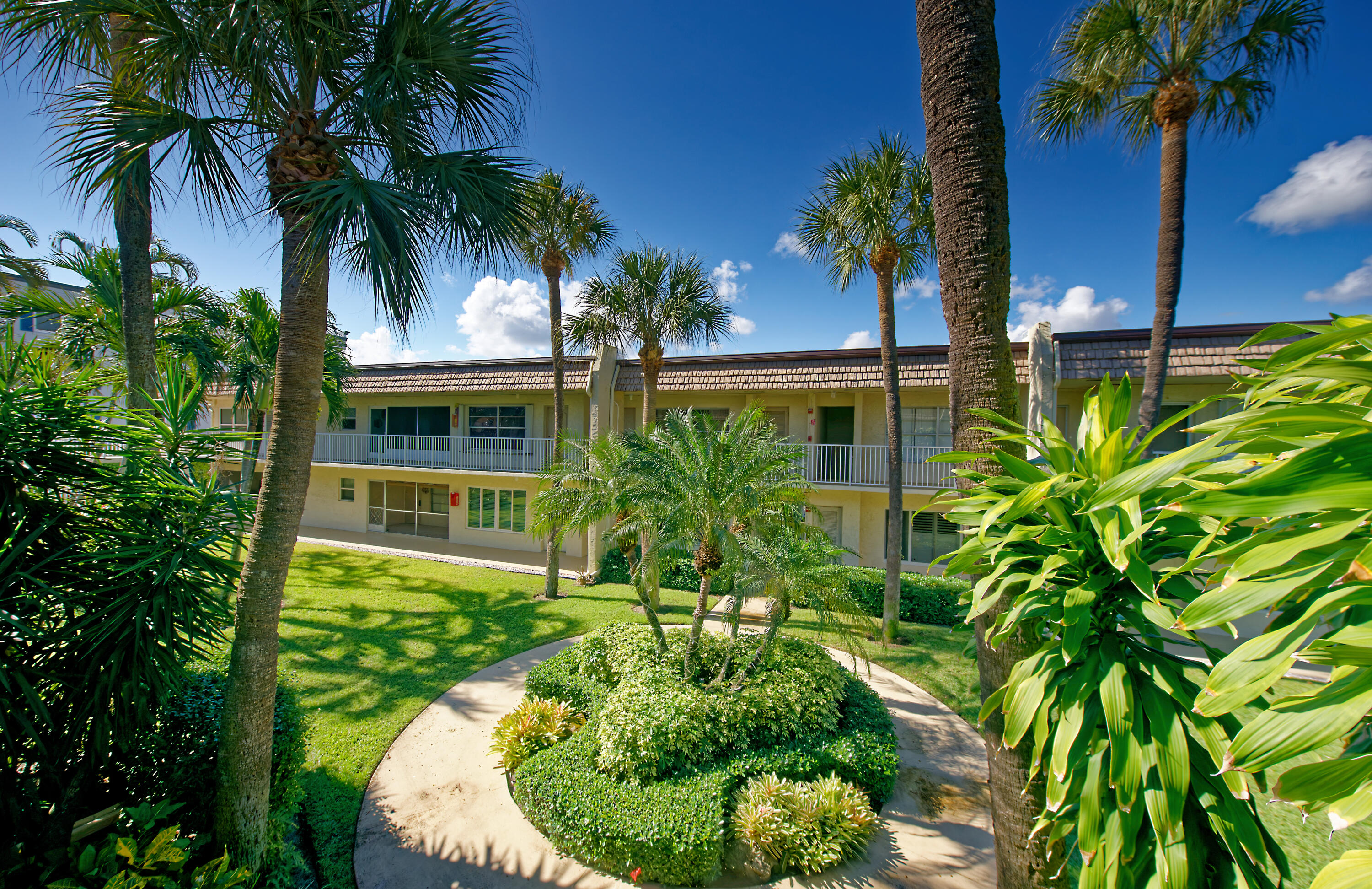 632 Snug Harbor Drive, Unit D15 Boynton Beach, FL 33435 - Photo 33 of 50 a view of a house with a palm tree