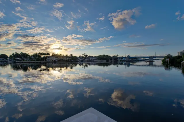 a view of a chairs and table in the patio