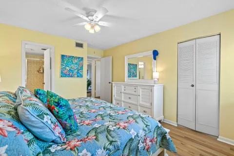 a bedroom with a bed and a dresser