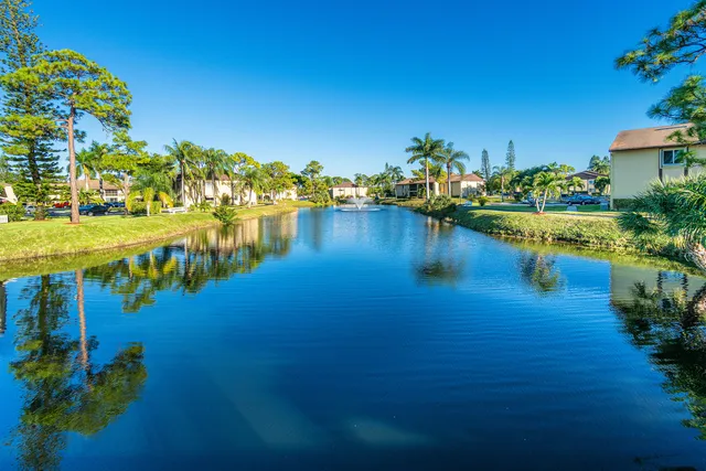 a view of a lake with a house