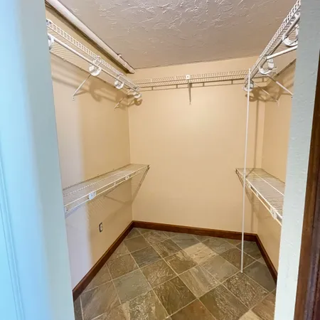 a view of a room with racks on the wall