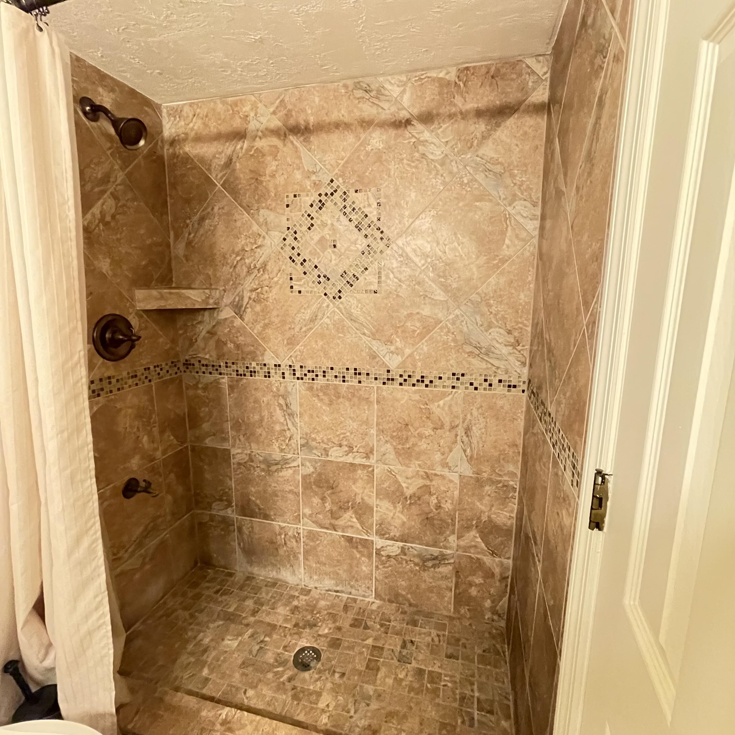 1540 Riverside Drive, Unit 14 Titusville, FL 32780 - Photo 21 of 29 a bathroom with a shower