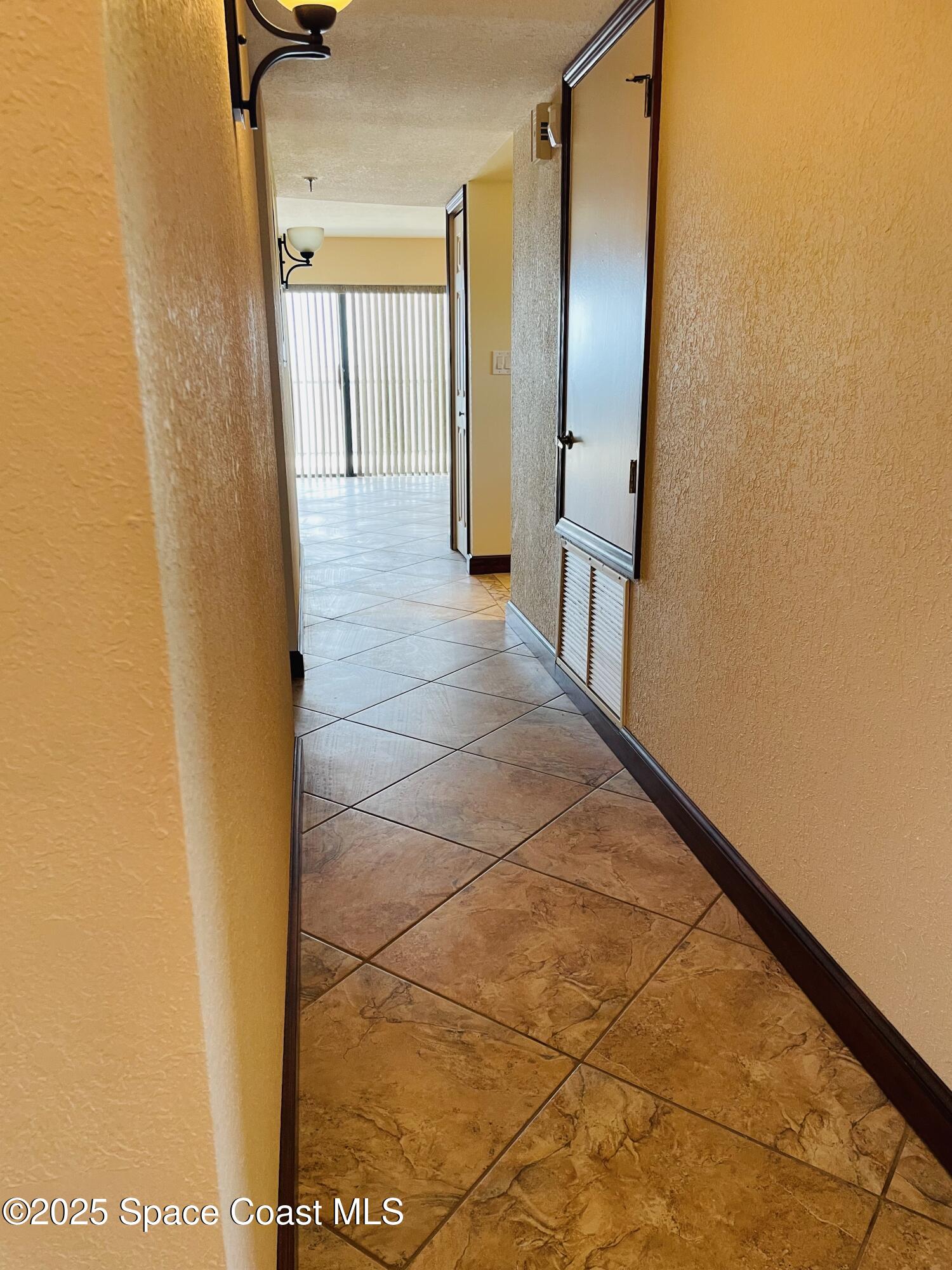 1540 Riverside Drive, Unit 14 Titusville, FL 32780 - Photo 7 of 29 a view of a hallway