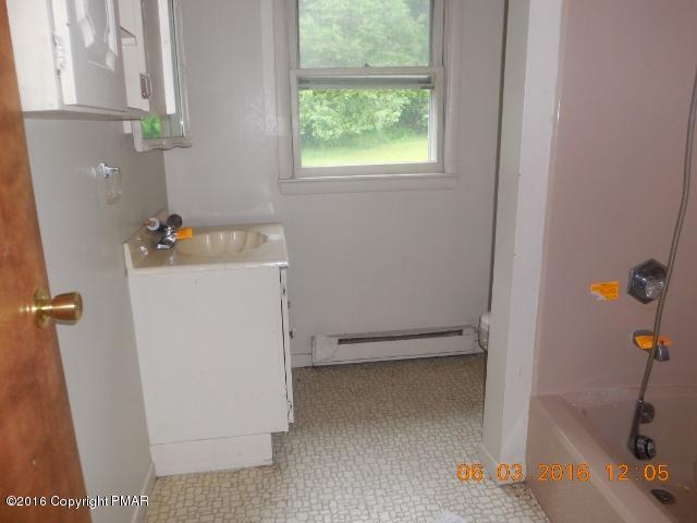159 Doney Road Gilbert, PA 18331 - Photo 11 of 14 a view of storage and utility room with a window dryer and washer