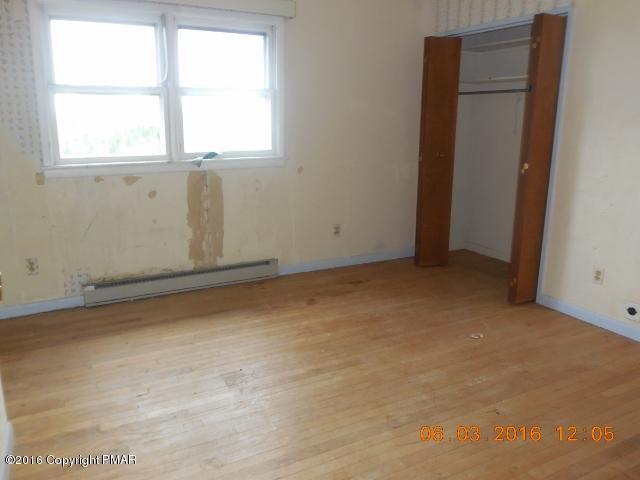 159 Doney Road Gilbert, PA 18331 - Photo 12 of 14 an empty room with windows