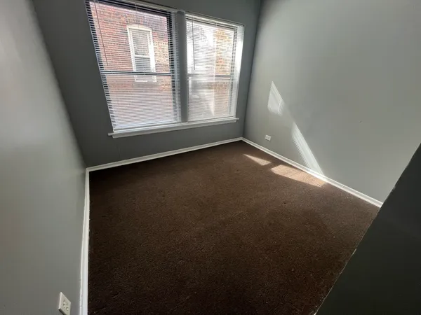 an empty room with a window