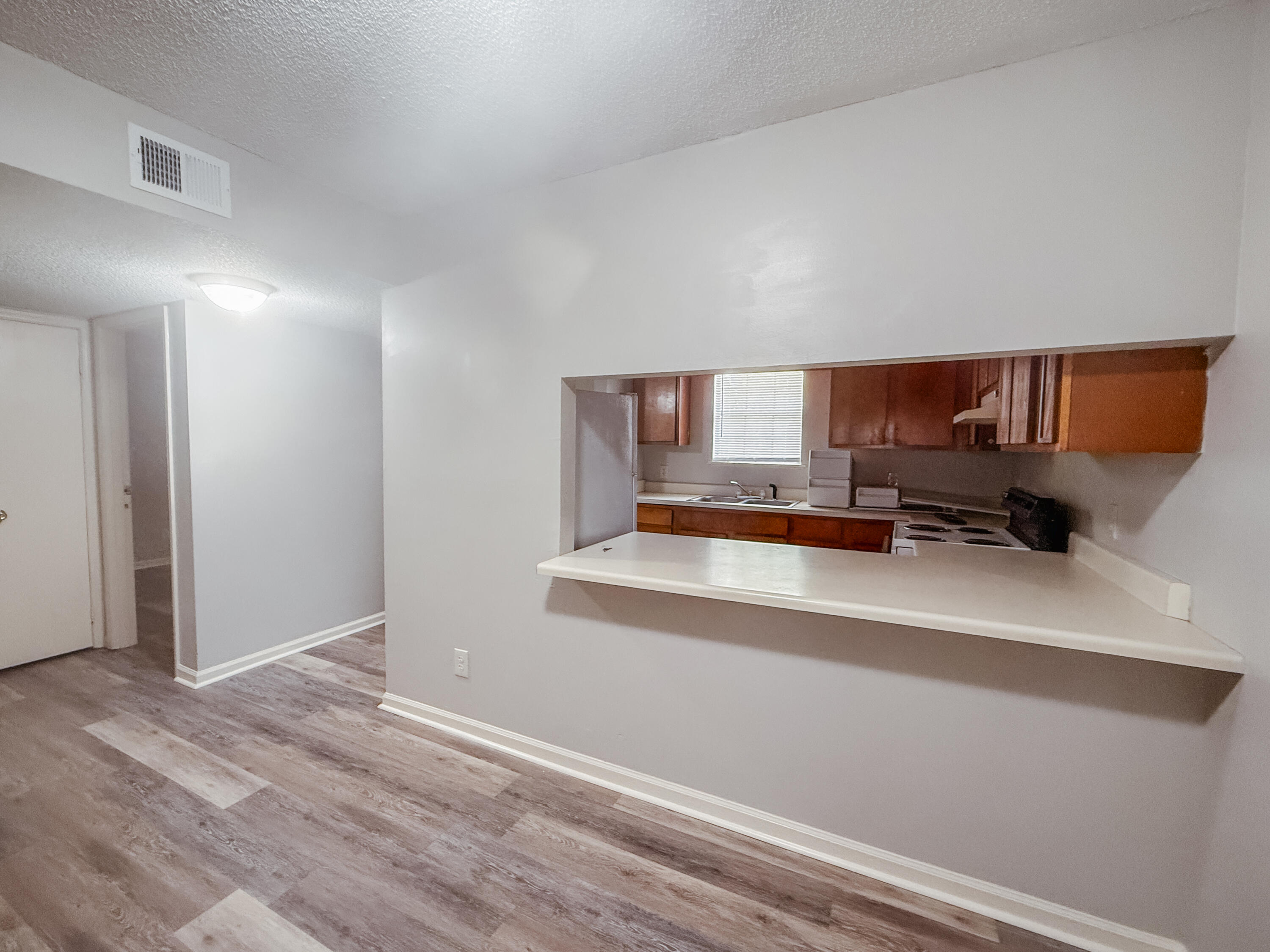 4260 Highway 90, Unit 42 Pace, FL 32571 - Photo 4 of 10 a view of a kitchen with a sink and a window