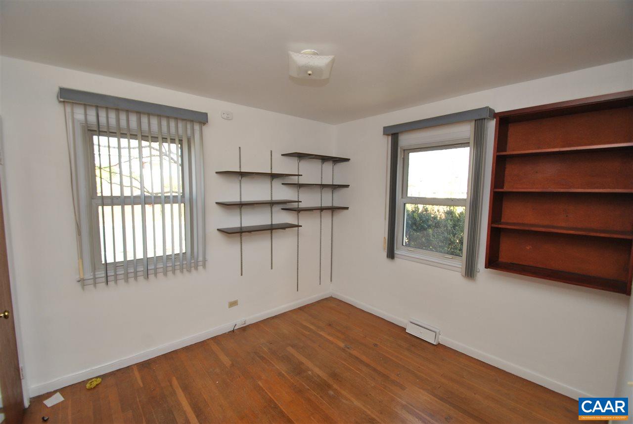 1000 Ridge Street Charlottesville, VA 22902 - Photo 6 of 17 a view of empty room with wooden floor and windows