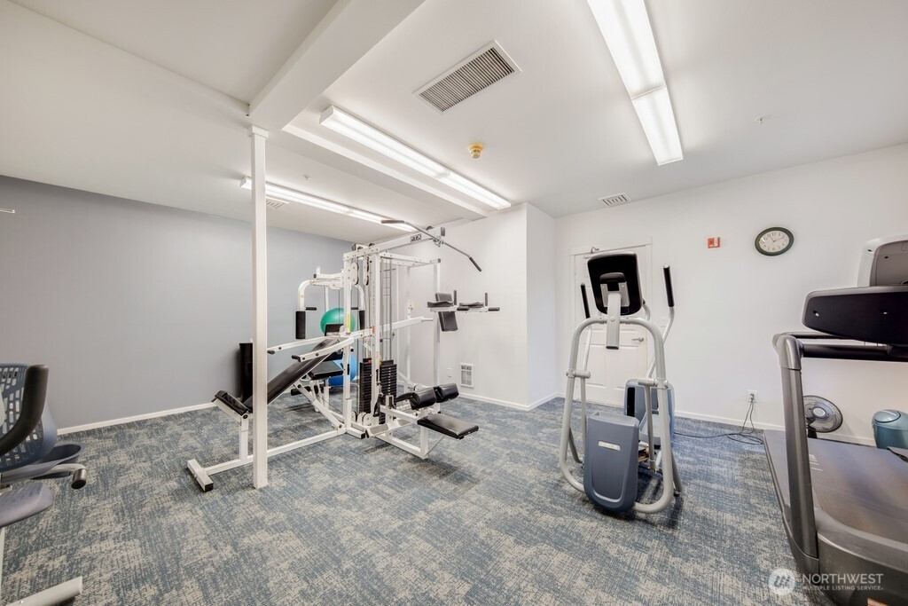 10042 Main Street, Unit 203 Bellevue, WA 98004 - Photo 19 of 30 a view of a room with gym equipment