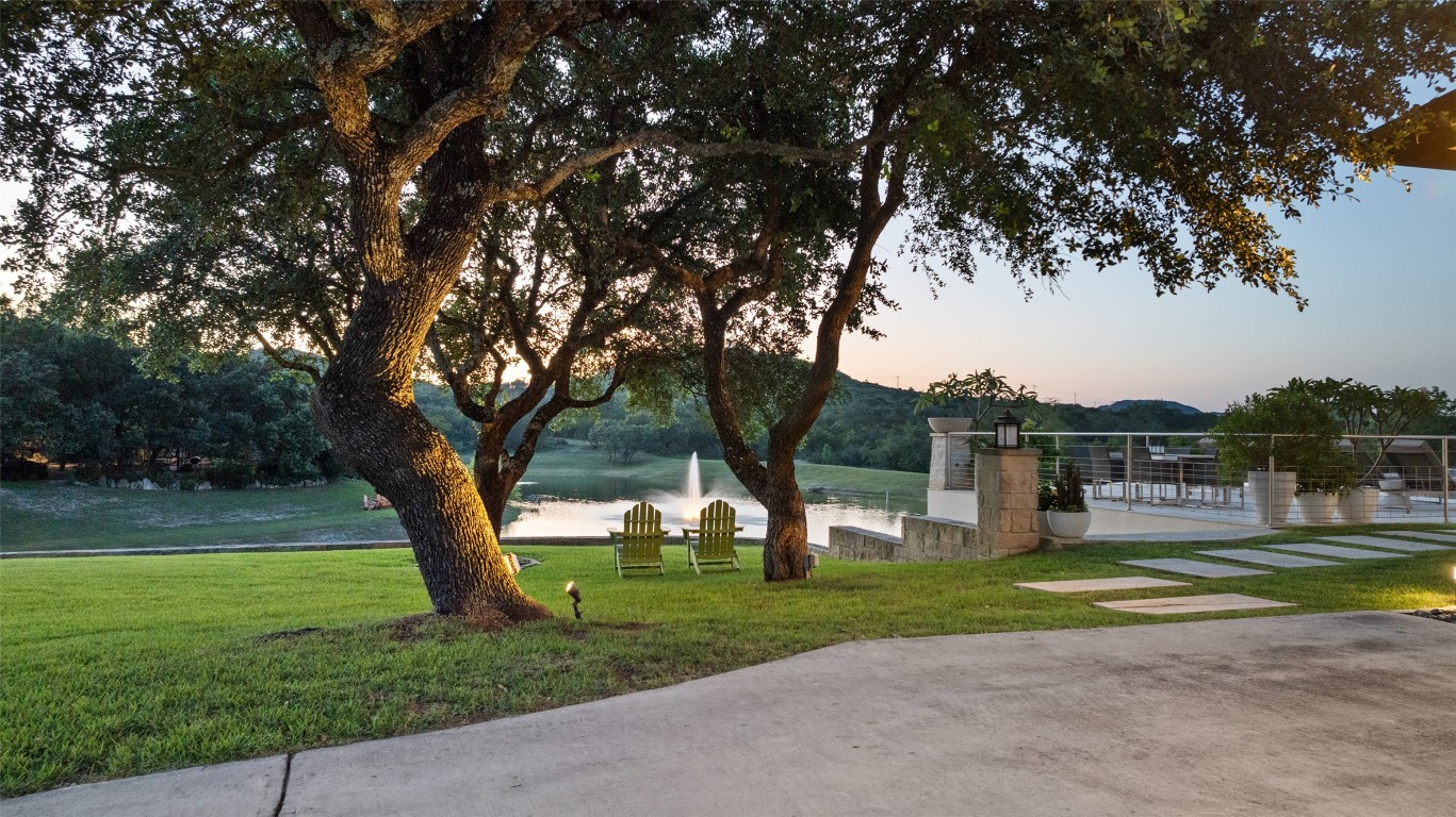 101 Rolling Hills Road Blanco, TX 78606 - Photo 16 of 38 a view of a yard with a tree