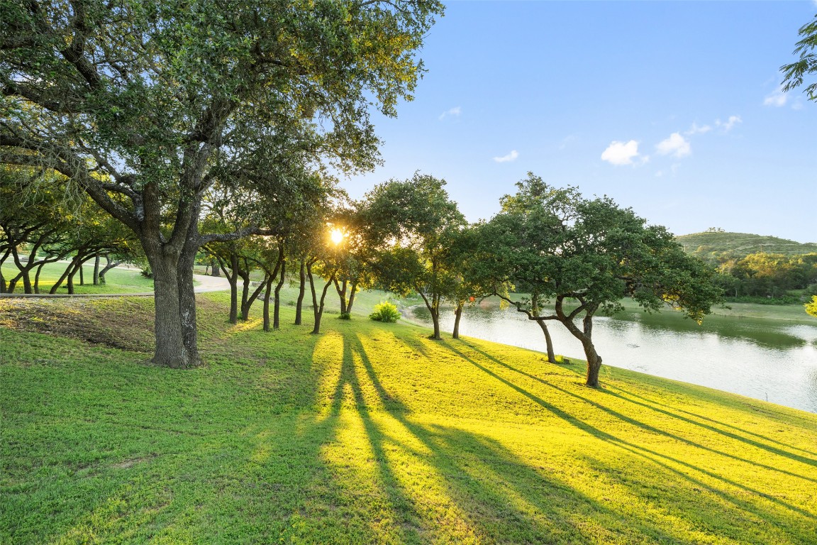 101 Rolling Hills Road Blanco, TX 78606 - Photo 28 of 38 a swimming pool with outdoor seating and yard