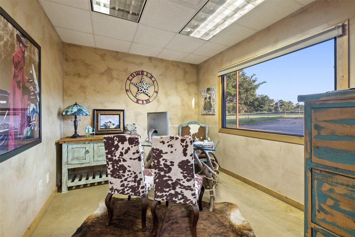 101 Rolling Hills Road Blanco, TX 78606 - Photo 31 of 38 a bed room with a bed and a painting on the wall