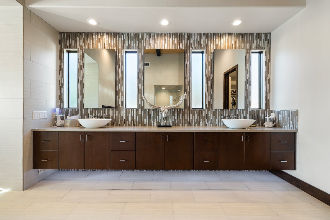 101 Rolling Hills Road Blanco, TX 78606 - Photo 7 of 38 a bathroom with a double vanity sink mirror and double