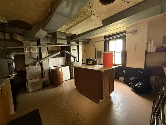 a kitchen with a refrigerator and washer