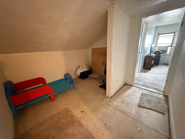 a view of a kitchen with a sink