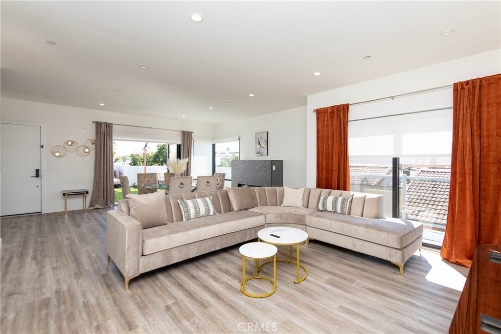 325 Myrtle Street, Unit 301 Glendale, CA 91203 - Photo 17 of 28 a living room with furniture and a large window