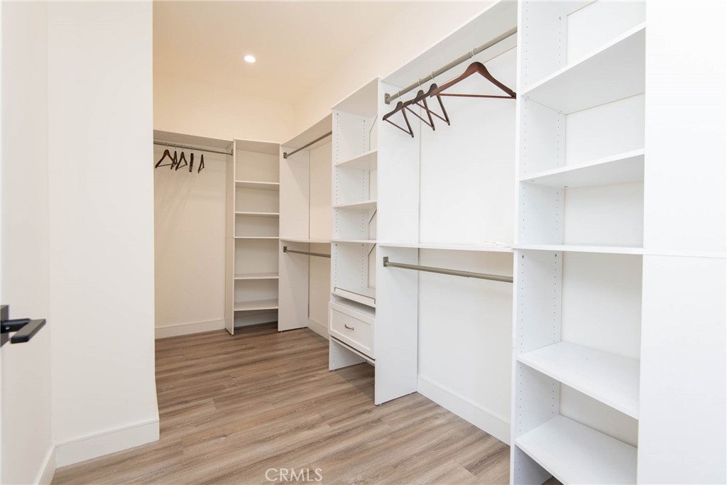325 Myrtle Street, Unit 301 Glendale, CA 91203 - Photo 23 of 28 a view of walk in closet with empty racks