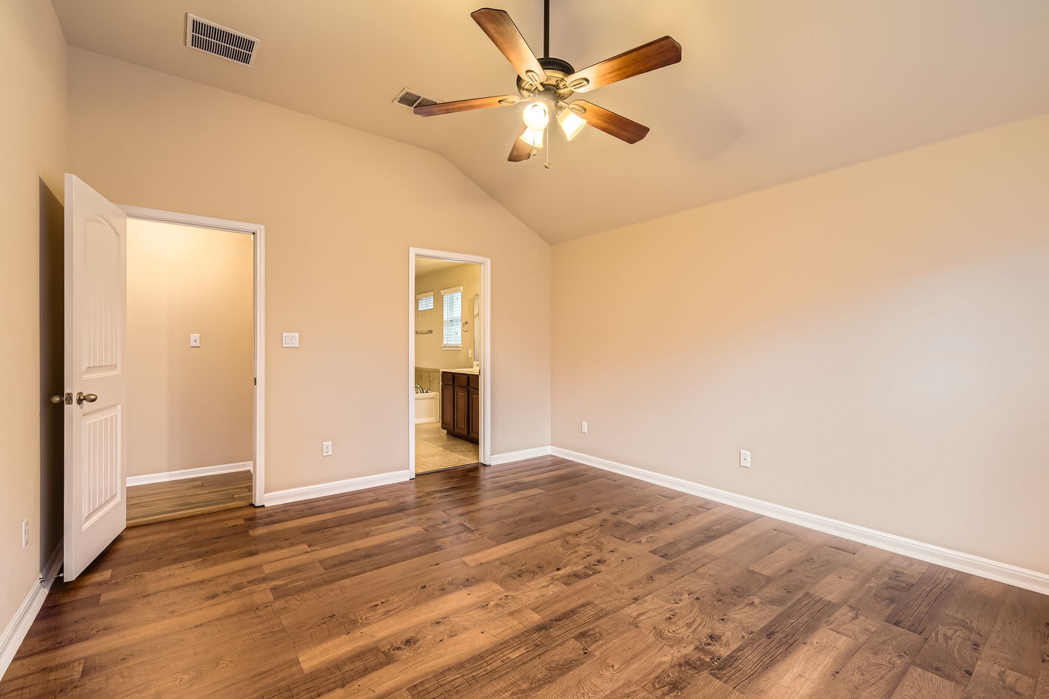 547 Stone View Trail, Unit 112 Austin, TX 78737 - Photo 13 of 28 wooden floor in an empty room