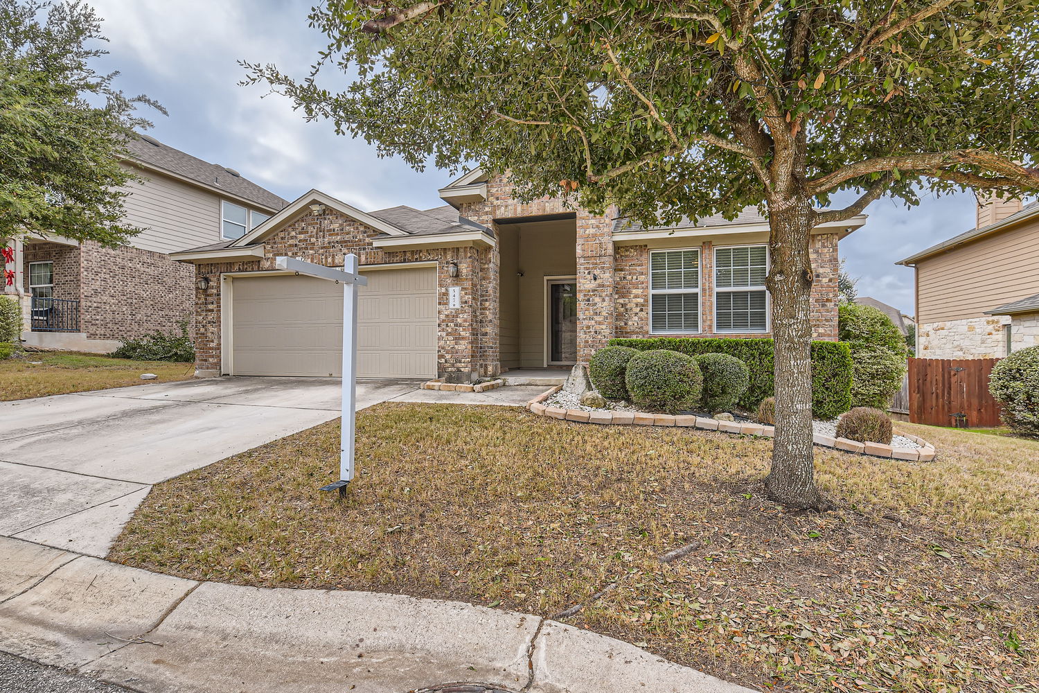547 Stone View Trail, Unit 112 Austin, TX 78737 - Photo 2 of 28 front view of a house with a yard