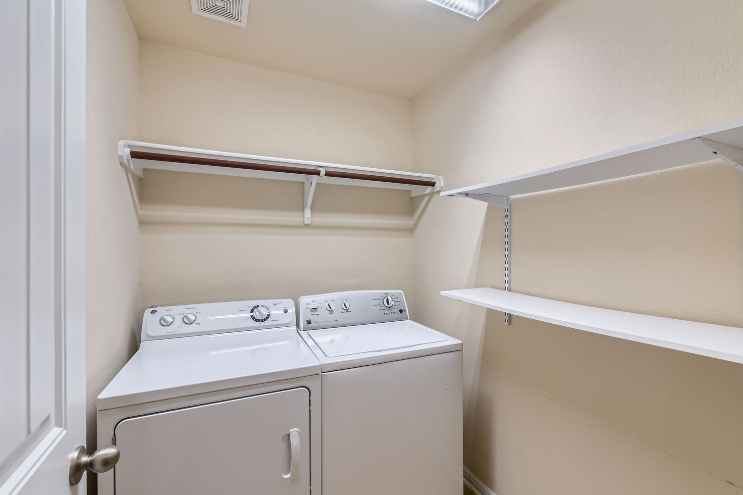 547 Stone View Trail, Unit 112 Austin, TX 78737 - Photo 21 of 28 a utility room with dryer and washer
