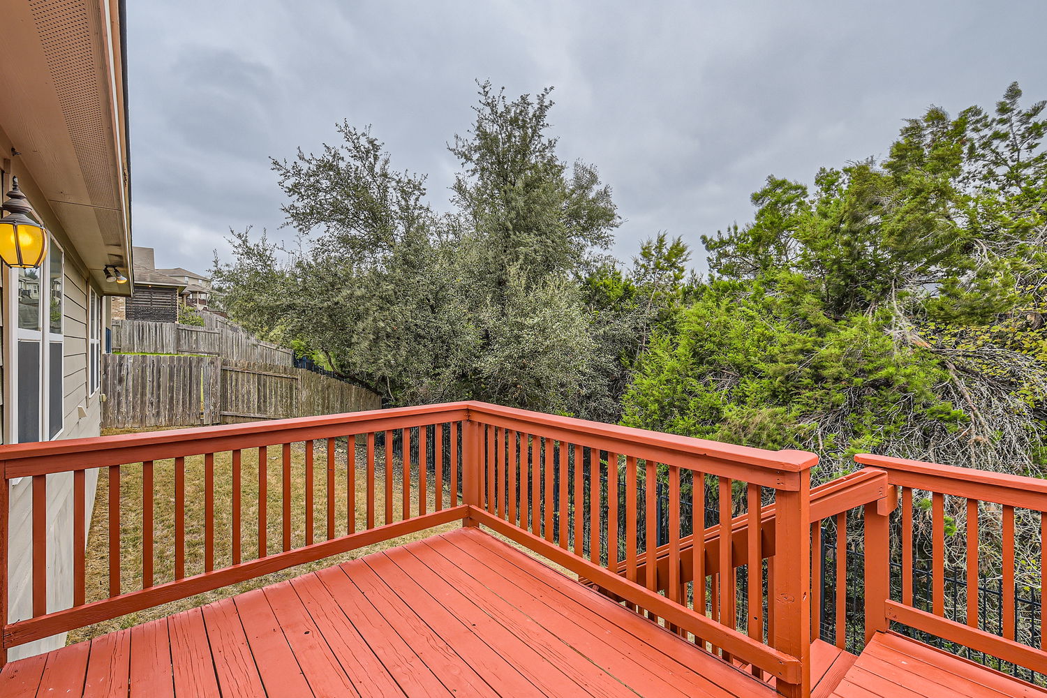 547 Stone View Trail, Unit 112 Austin, TX 78737 - Photo 23 of 28 a view of balcony with wooden floor
