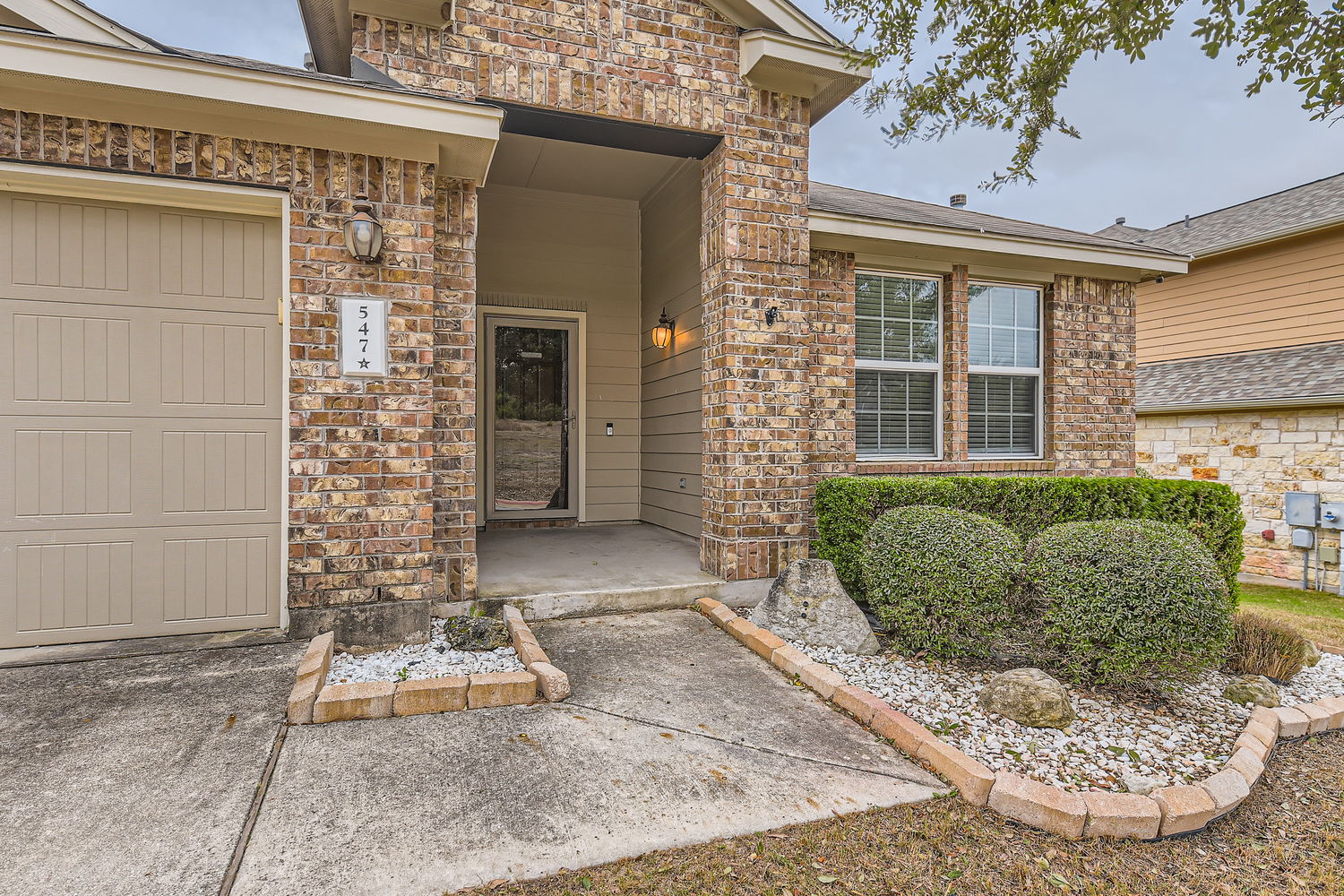 547 Stone View Trail, Unit 112 Austin, TX 78737 - Photo 3 of 28 front view of a house with a window