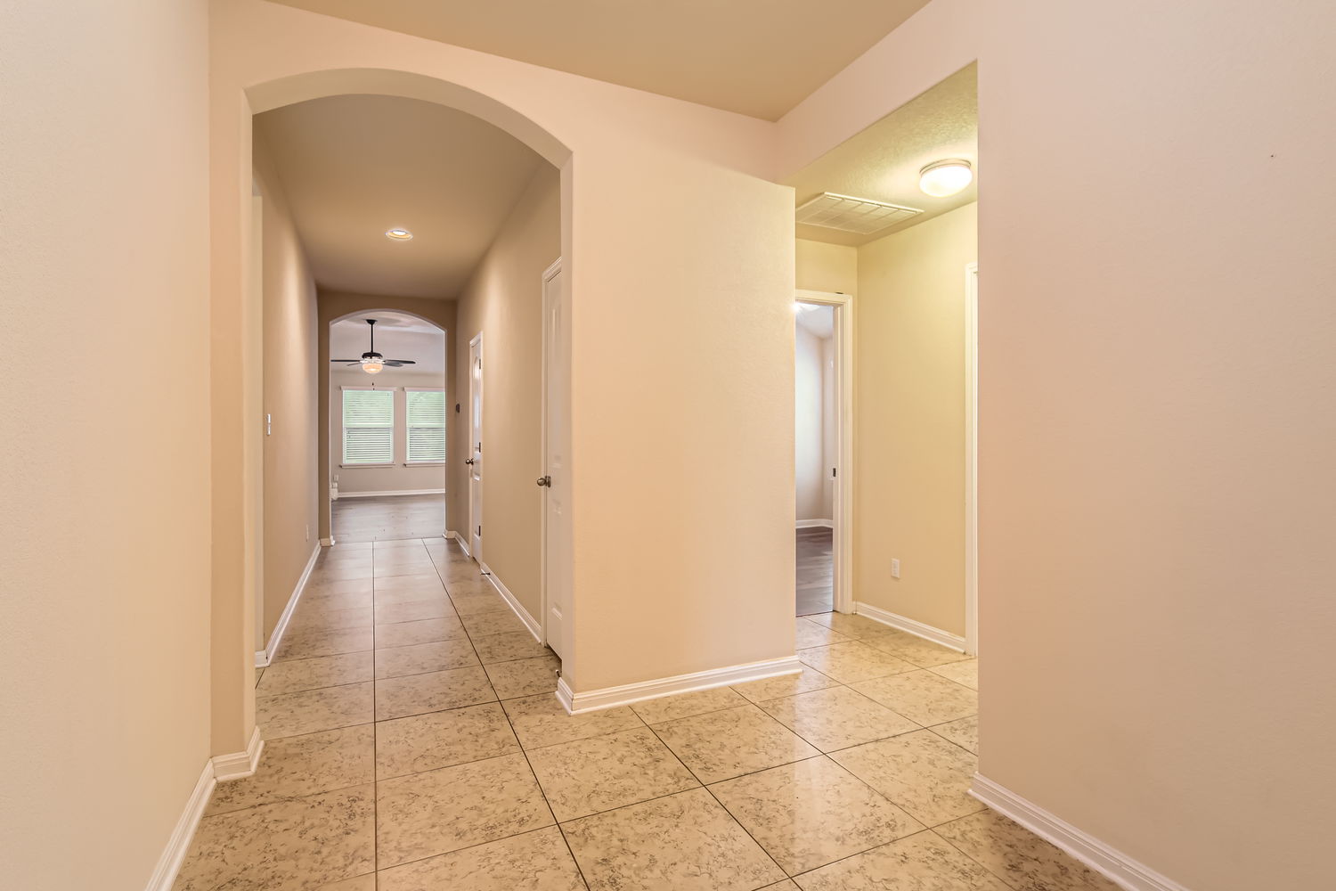 547 Stone View Trail, Unit 112 Austin, TX 78737 - Photo 4 of 28 a view of a hallway with wooden floor