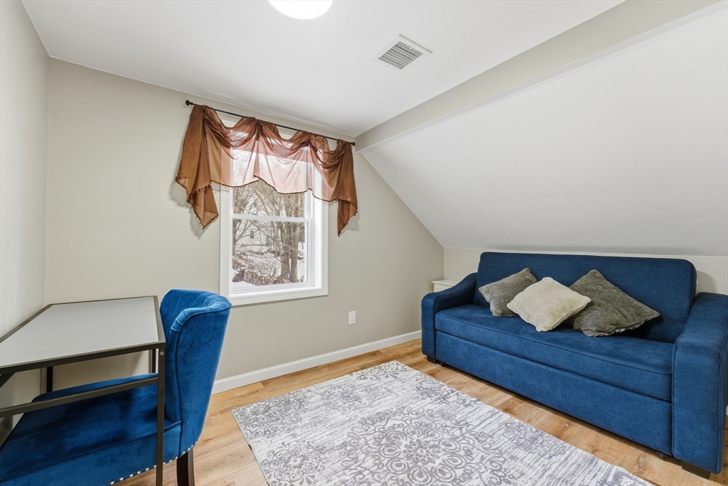160 Cottage Street Athol, MA 01331 - Photo 24 of 35 a bedroom with a bed and window