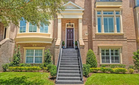 a front view of a house having yard