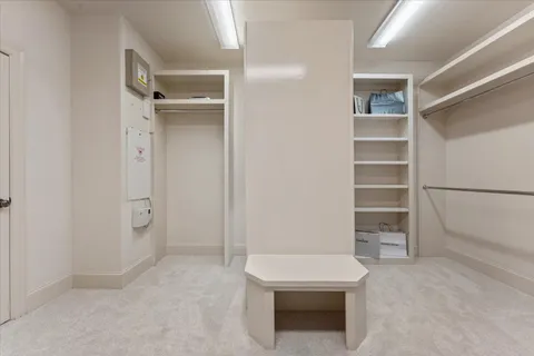 a view of an empty walk in closet